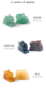 Detailed selection of rabbit sculptures carved from green aventurine and agate stones