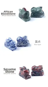 Three stone rabbit carvings in African Bloodstone, Blue Spot, and Sesame Jasper