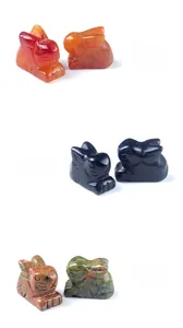 Detailed comparison of rabbit figurines in Red Agate, Obsidian, and Unakite gemstones