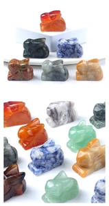Detailed view of hand-carved natural crystal rabbit figurines in various gemstones
