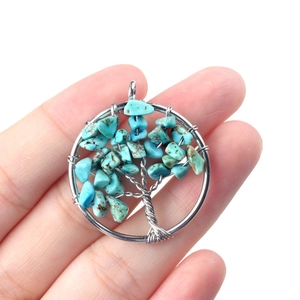 Pendentif arbre de vie en turquoise naturelle avec artisanat de fil d'argent enroulé