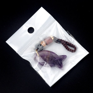 Handcrafted purple amethyst fish keychain pendant with ornate woven brown cord and wooden beads