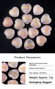 Macro detail of natural rose quartz heart stones with golden engraved positive words