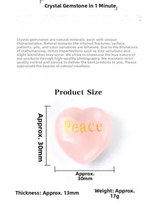 Detail view of pink heart crystal with Peace engraving measuring thirty millimeters
