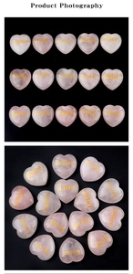 Close-up of pink quartz heart stones with gold engraved words Love Peace and Healing