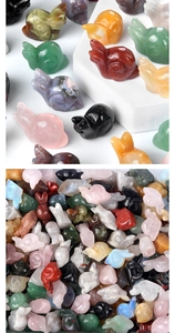 Detailed view of hand-carved crystal snail figurines in various natural gemstones