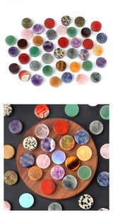 Detailed view of polished natural crystal agate stone discs in various colors and textures