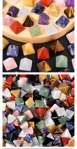 Macro shot of colorful assorted natural gemstone pyramids for home energy decor