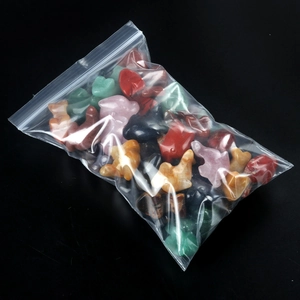 Mixed set of 1-inch carved natural gemstone dolphin and animal figurines in various crystals