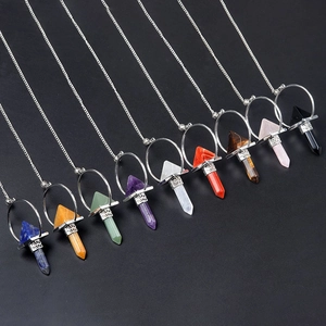 Set of nine hexagonal crystal pyramid pendants on silver chains in various gemstones