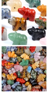 Detailed macro view of assorted natural gemstone polar bear carvings in various textures