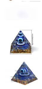 Detailed view of a 6cm Lapis Lazuli Orgonite Pyramid with Eye of the Devil and gold foil