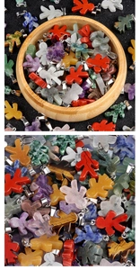 Detailed view of assorted natural stone girl pendants for DIY jewelry making