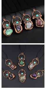 Detailed view of vintage bronze pendants with raw crystals and turquoise sun inlay accents