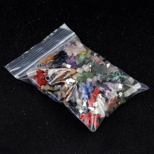 Mix of carved natural crystal pendants in various colors with silver metal clasps