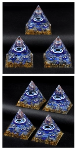 Macro view of Orgonite Pyramid with Evil Eye bead, lapis lazuli stones and copper coil