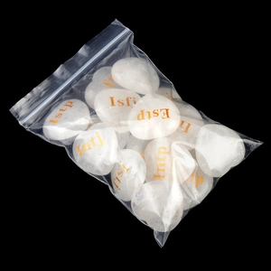 Polished white heart-shaped crystals featuring golden MBTI personality type engravings