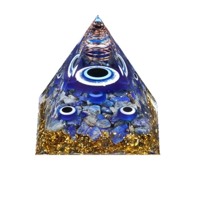 Orgone pyramid with Evil Eye, copper spiral, lapis lazuli stones and gold foil decor