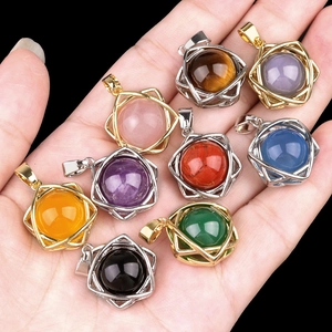 Assorted gemstone sphere pendants with geometric wire wrap in gold and silver finish