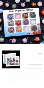 Detailed view of 12-piece mini gemstone pumpkins in a blue display box for decoration