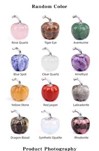 Macro shot of 12 natural semi-precious stone pumpkin pendants with silver clasps