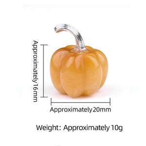 Mini carved yellow stone pumpkin ornament measuring 20mm by 16mm for Halloween decor