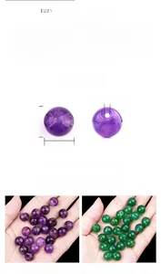 Macro detail of 10mm amethyst and green agate beads with precise dimension markings