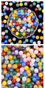 Macro detail of assorted colorful polished amethyst and agate beads for DIY crafts