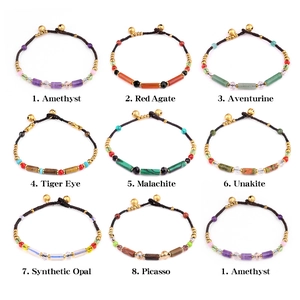 Natural semi-precious crystal tube bracelets with hand-woven cord and golden bells