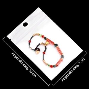 Natural crystal tube bracelet with gold bells in professional 10cm x 7cm PE packaging