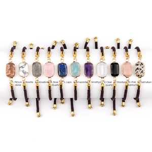 Eleven colorful natural gemstone bracelets with rectangular facets and adjustable ropes