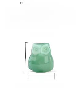 Macro view of green quartz owl crystal carving with height and width dimensions