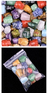 Detailed macro shot of diverse hand-carved crystal owl figurines with secure packaging