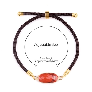 Bracelet ajustable en cordon tressé marron avec pierre précieuse rouge ovale et or