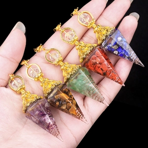 Set of five colorful hexagonal crystal resin pendants with golden wire wrap