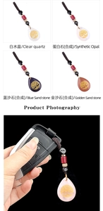 Detailed view of teardrop gemstone pendant with golden Tree of Life symbol and braided cord