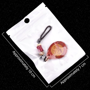 Waterdrop shape red stone pendant keychain with golden tree of life and woven rope cord