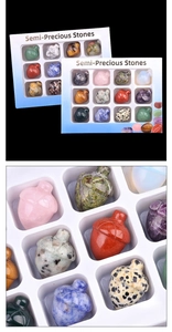 Detailed view of 12 assorted semi-precious stone carvings in a white gift box