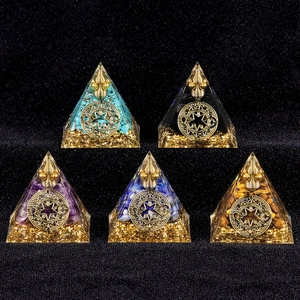 Set of five handmade Orgone pyramids with crystal stones and metal coils for home decor