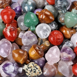 Polished mini crystal acorns carved from amethyst, rose quartz and tiger eye stones