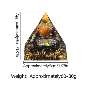 5cm Orgone crystal pyramid with tree of life, tiger eye stone, and black crushed stones