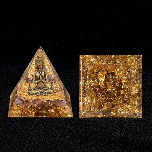 Amethyst orgone pyramid with golden Buddha and gold foil in clear resin 6cm base