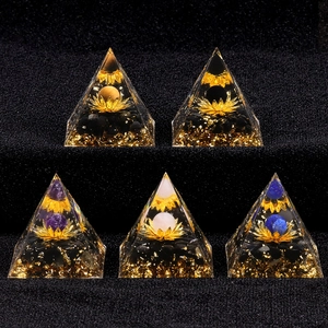 Set of 5cm Orgonite pyramids with metal lotus, gold leaf, and healing crystal spheres