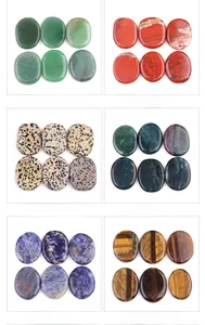 Variety set of oval worry stones in aventurine, jasper, agate, and tiger eye minerals