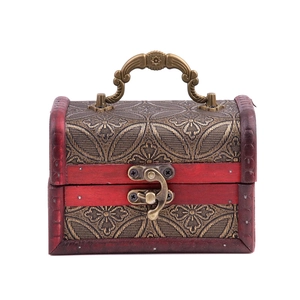 Vintage wooden jewelry box with red floral pattern and bronze metal handle on white background