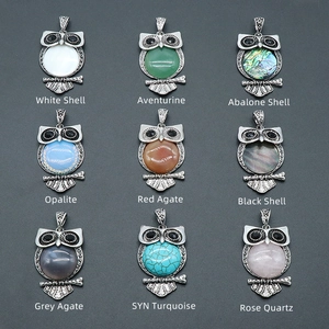 Set of 9 owl pendants with various gemstones including opalite rose quartz and aventurine
