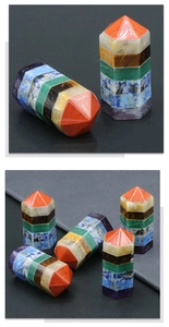 Macro detail of natural seven chakra gemstone hexagonal tower with layered mineral textures