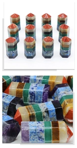 Macro view of multi-layered seven chakra natural gemstone hexagonal towers with polished finish