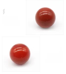 Macro view of natural Red Jasper and Red Agate 25mm crystal spheres for chakra yoga