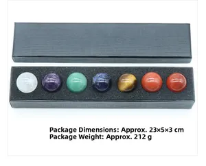 Detail view of 7 chakra crystal stones in a black gift box with 23x5x3cm packaging